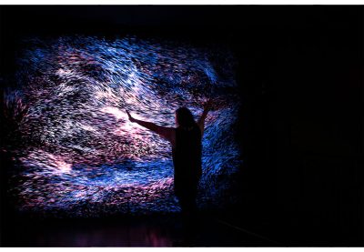 Woman at WNDR exhibit